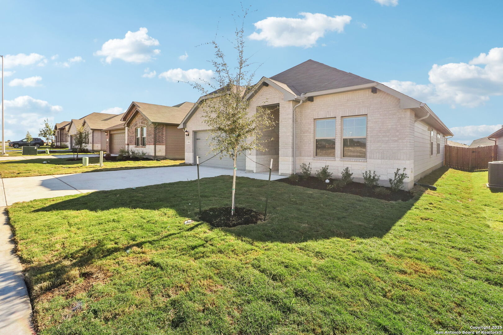114 Dakota Ridge Cibolo, TX 78108 - Photo 4 of 39 a view of a house with a yard