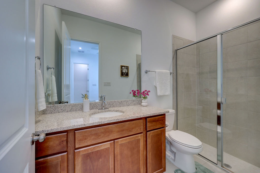 351 Pigeon River Road Kyle, TX 78640 - Photo 29 of 40 Full bath featuring vanity and a shower stall