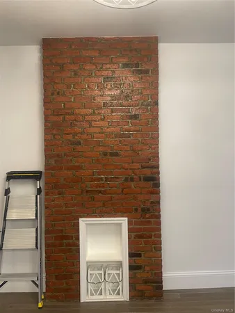 a brick wall with a sink