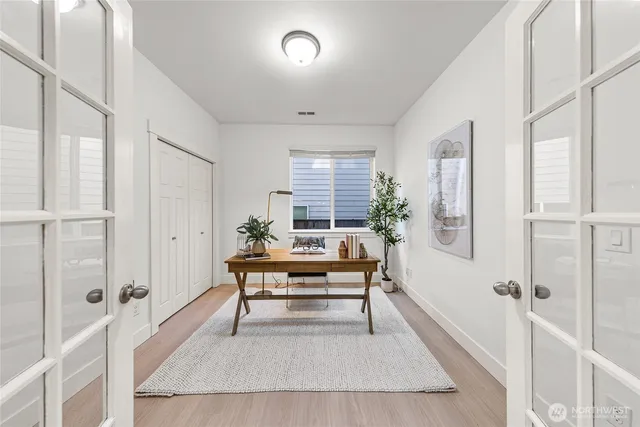 a living room with furniture and a table