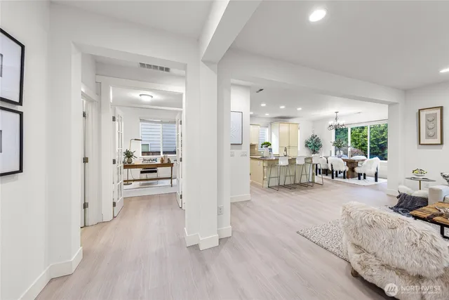 a living room with furniture and a table