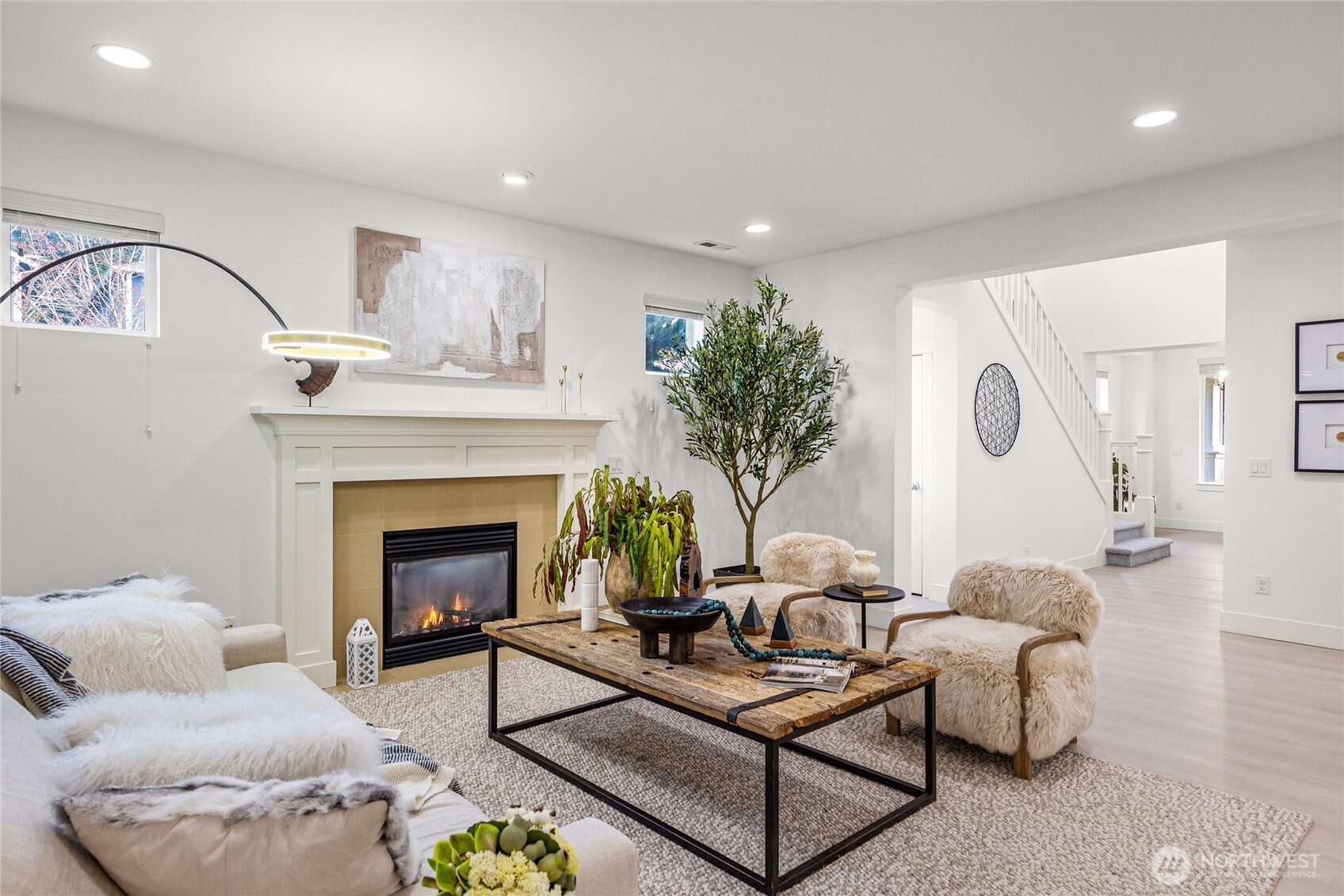 4115 176th Place Southeast Bothell, WA 98012 - Photo 9 of 35 a living room with furniture and a fireplace