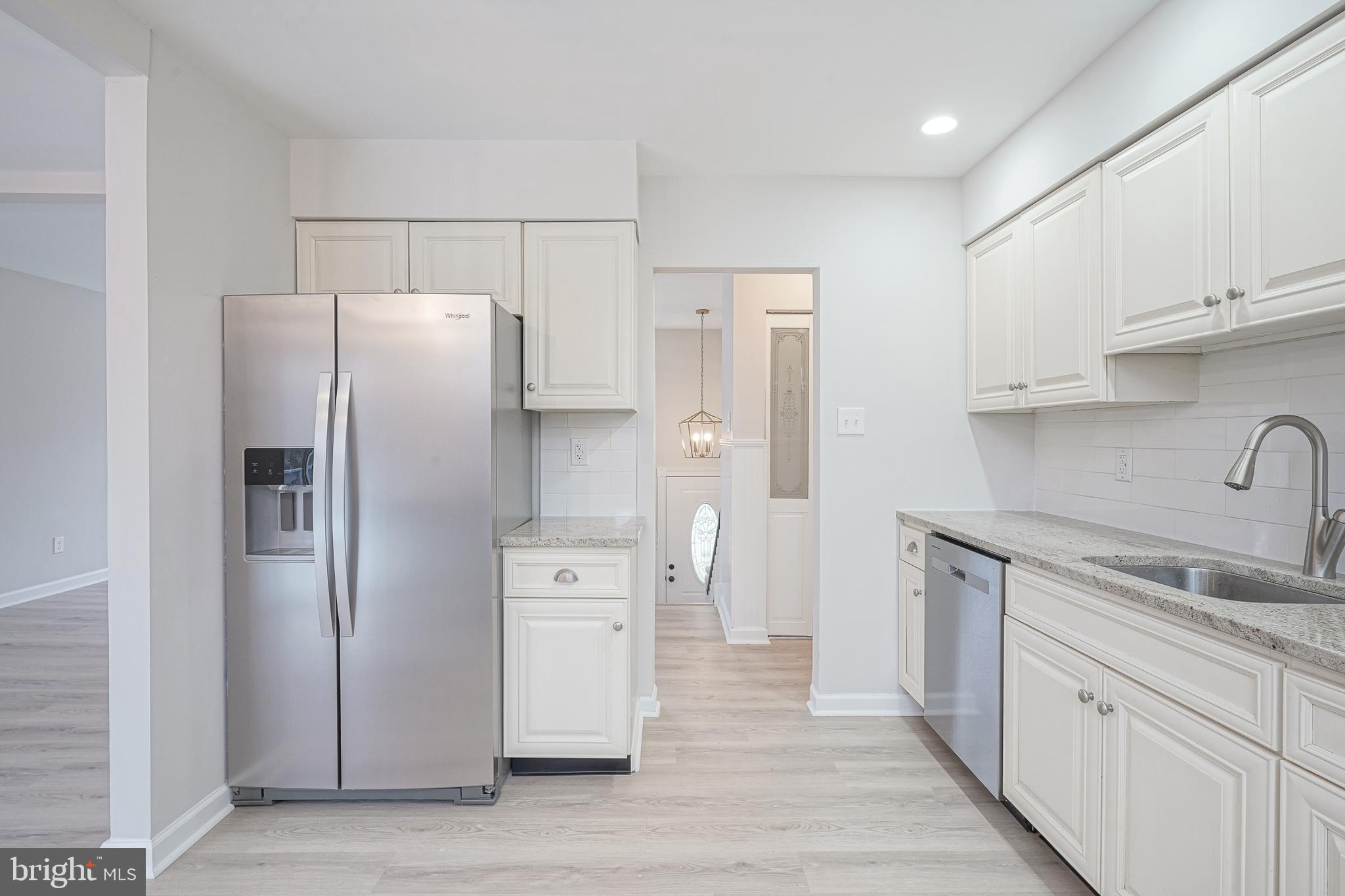 3 Alberts Avenue Sicklerville, NJ 08081 - Photo 13 of 36 a kitchen with stainless steel appliances a refrigerator and a sink