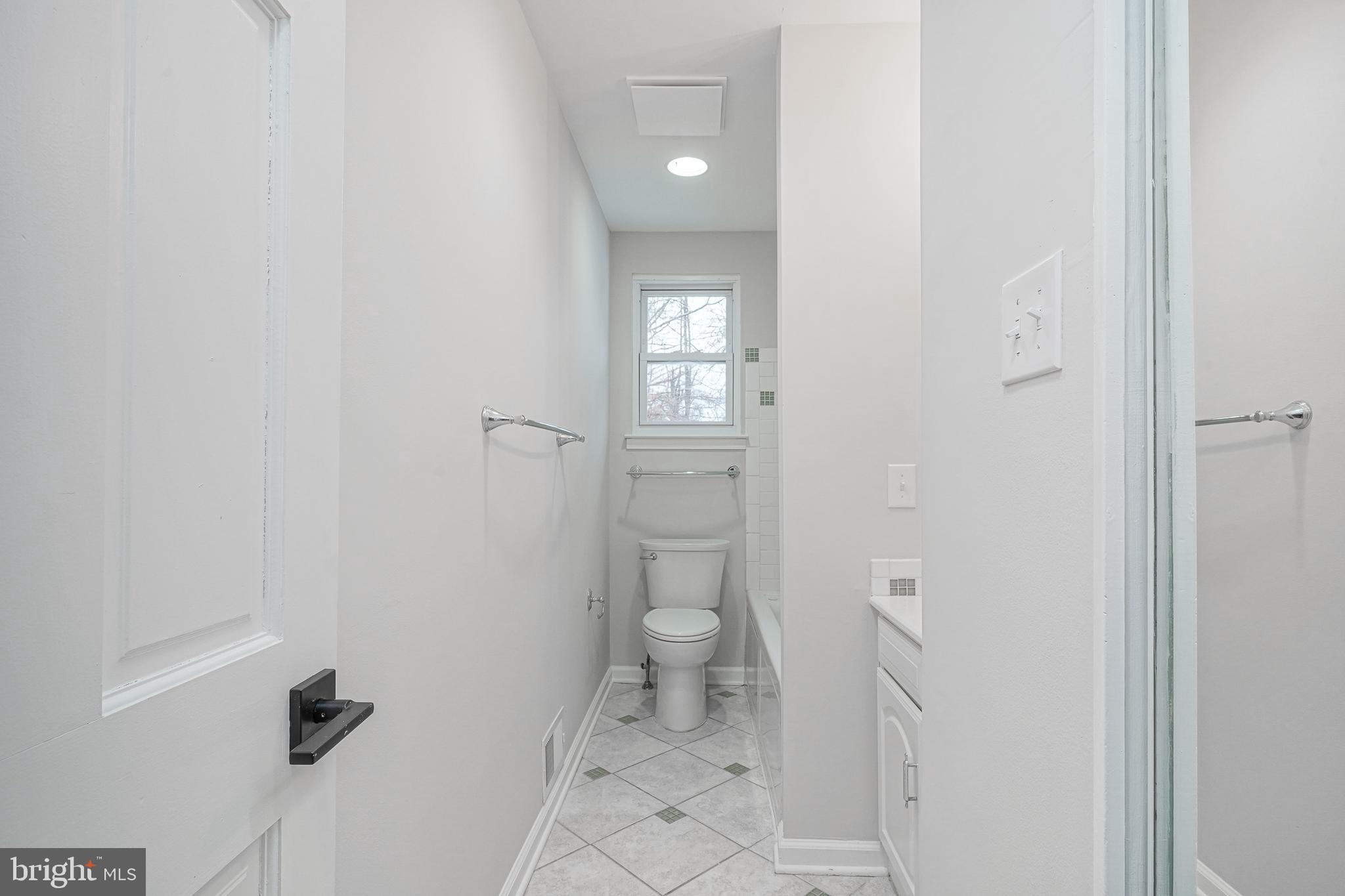 3 Alberts Avenue Sicklerville, NJ 08081 - Photo 25 of 36 a bathroom with a granite countertop toilet and a sink
