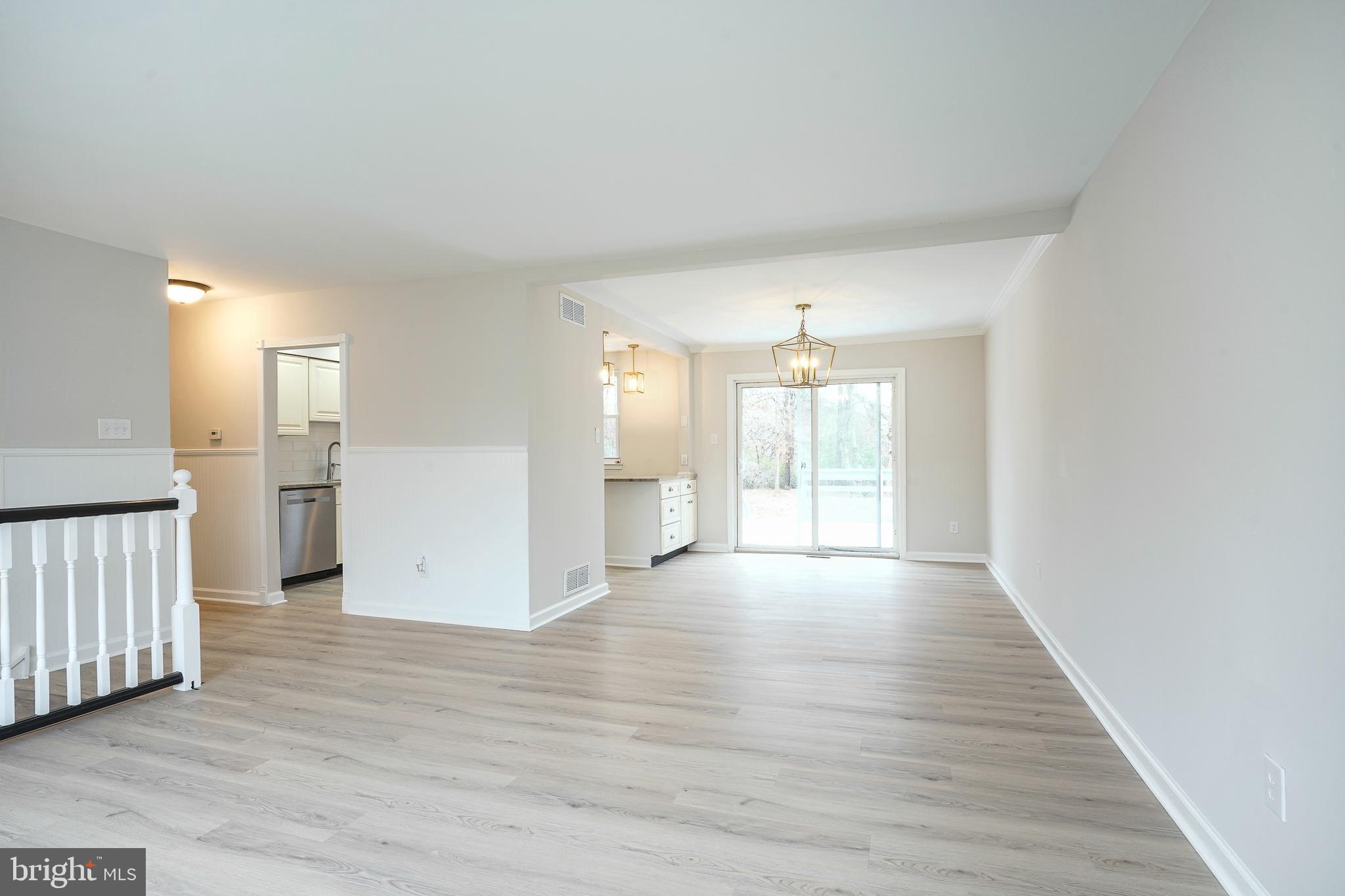 3 Alberts Avenue Sicklerville, NJ 08081 - Photo 4 of 36 a view of a big room with wooden floor and windows