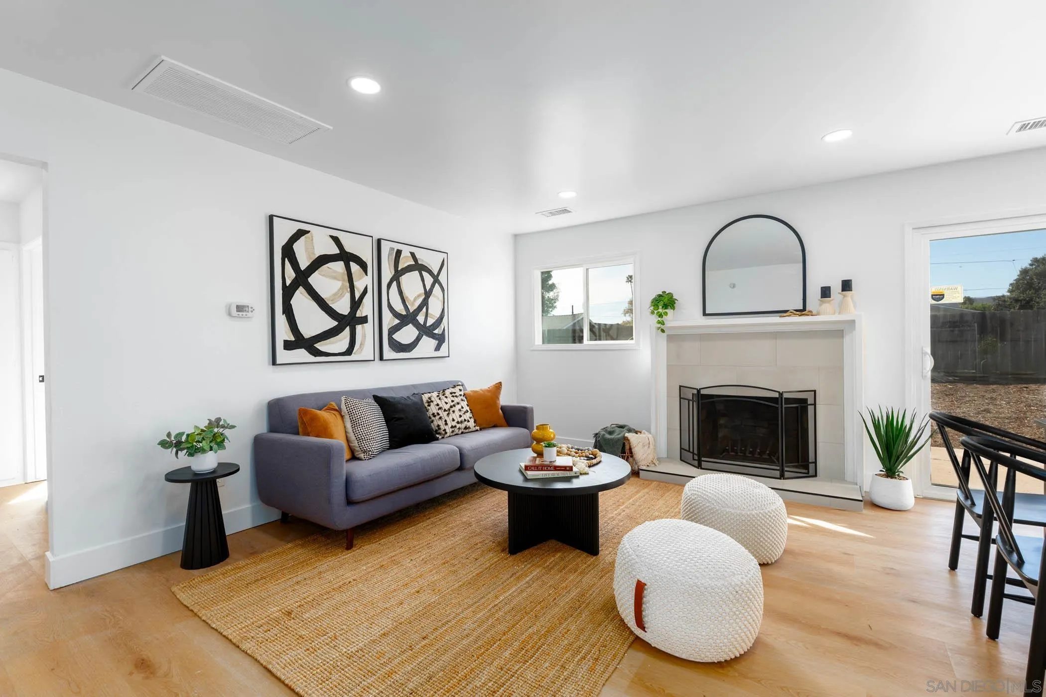 12918 Seiler Street Poway, CA 92064 - Photo 5 of 25 a living room with furniture and a fireplace