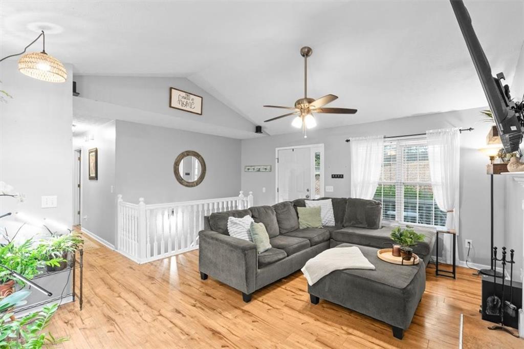 93 4th Street Emerson, GA 30137 - Photo 11 of 46 a living room with furniture and a chandelier