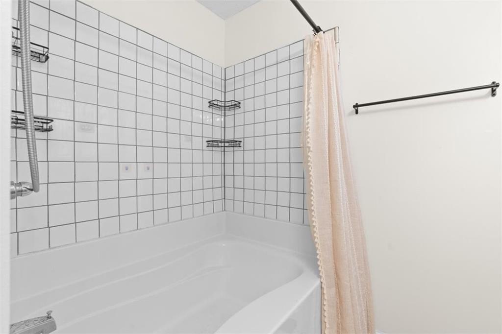 93 4th Street Emerson, GA 30137 - Photo 24 of 46 a bathroom with a bathtub