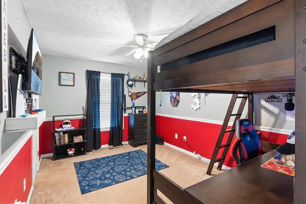 93 4th Street Emerson, GA 30137 - Photo 26 of 46 a living room with furniture and flat screen tv