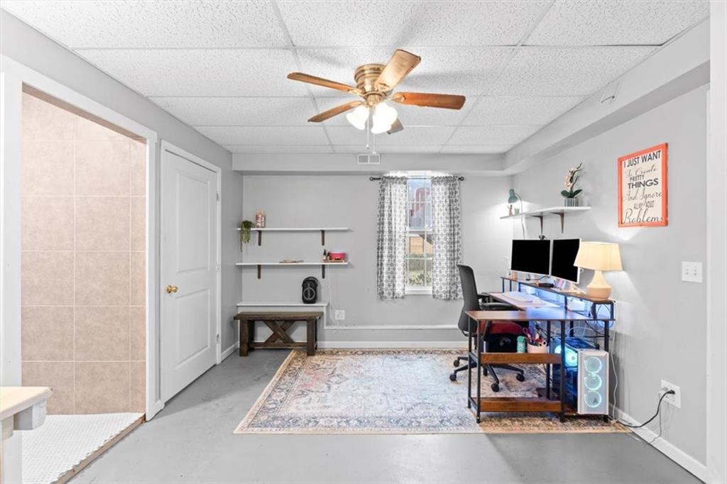 93 4th Street Emerson, GA 30137 - Photo 27 of 46 a view of a workspace with furniture and a window