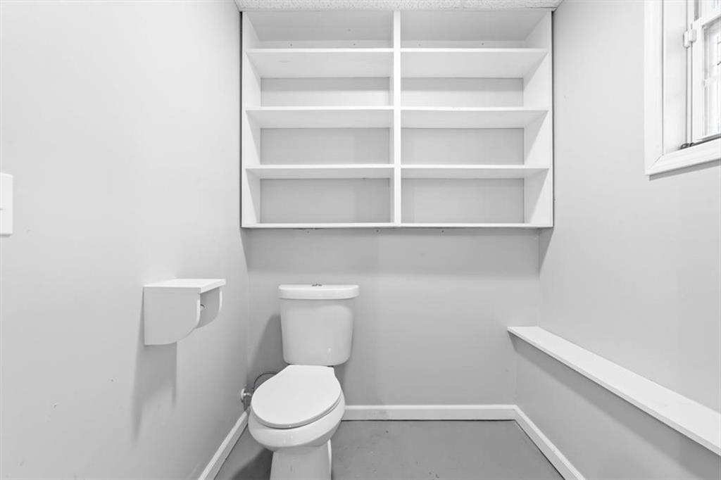 93 4th Street Emerson, GA 30137 - Photo 31 of 46 a bathroom with a toilet and a sink