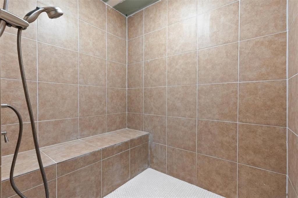 93 4th Street Emerson, GA 30137 - Photo 32 of 46 a bathroom with a shower