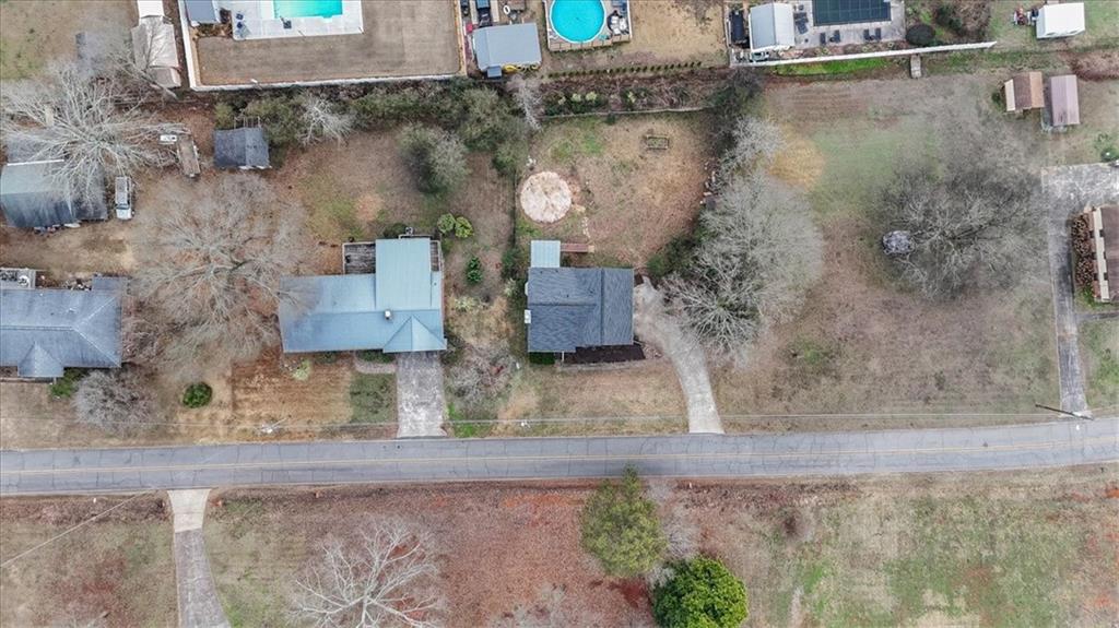 93 4th Street Emerson, GA 30137 - Photo 40 of 46 an aerial view of a house with a yard