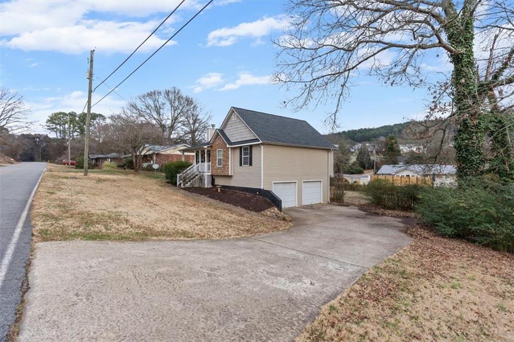 93 4th Street Emerson, GA 30137 - Photo 4 of 46 a view of a yard with a tree