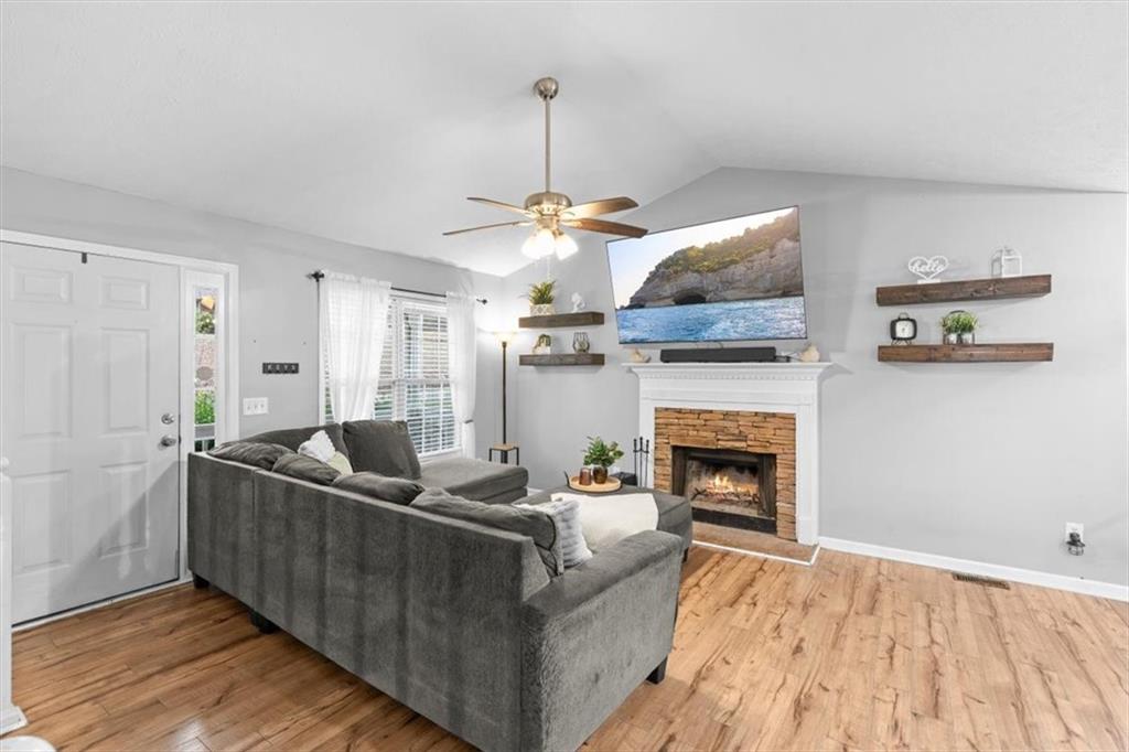 93 4th Street Emerson, GA 30137 - Photo 9 of 46 a living room with furniture and a fireplace