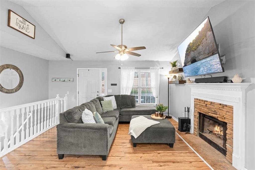 93 4th Street Emerson, GA 30137 - Photo 10 of 46 a living room with furniture and a fireplace
