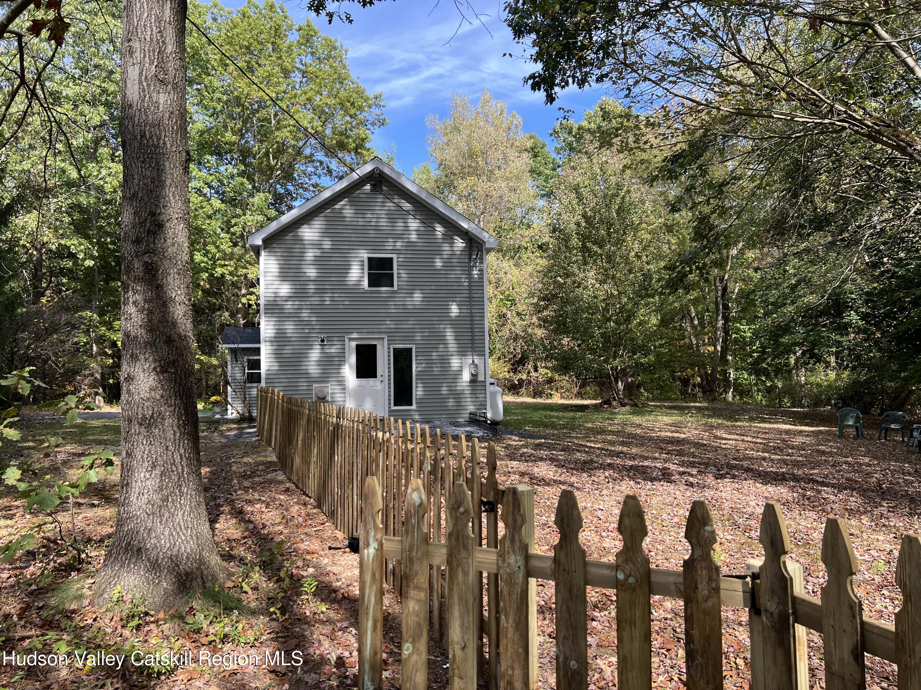 68 Orinsekwa Road Valatie, NY 12184 - Photo 30 of 41 a front view of a house with a yard