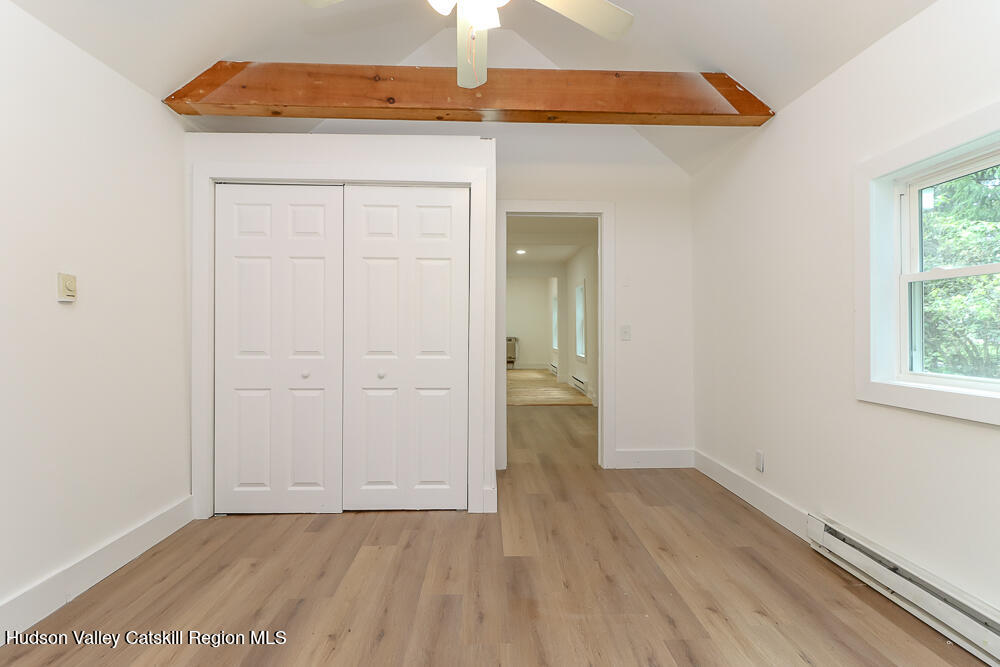 68 Orinsekwa Road Valatie, NY 12184 - Photo 8 of 41 an empty room with wooden floor and closet