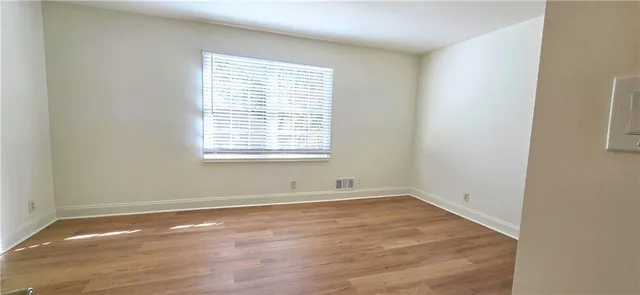 an empty room with a window