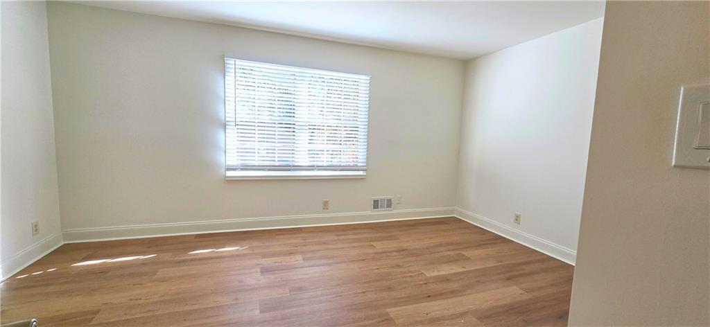 2826 Whippoorwill Circle Northwest Duluth, GA 30097 - Photo 13 of 24 an empty room with a window