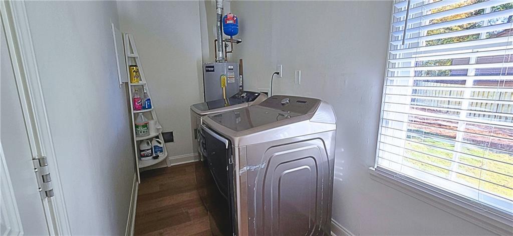 2826 Whippoorwill Circle Northwest Duluth, GA 30097 - Photo 20 of 24 a utility room with dryer and washer