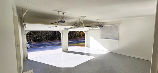 a view of a living room with hallway