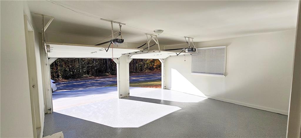 2826 Whippoorwill Circle Northwest Duluth, GA 30097 - Photo 21 of 24 a view of a living room with hallway