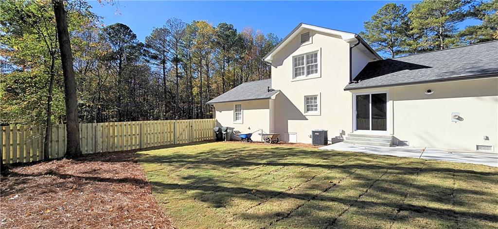 2826 Whippoorwill Circle Northwest Duluth, GA 30097 - Photo 23 of 24 a bathroom with a sink and a yard