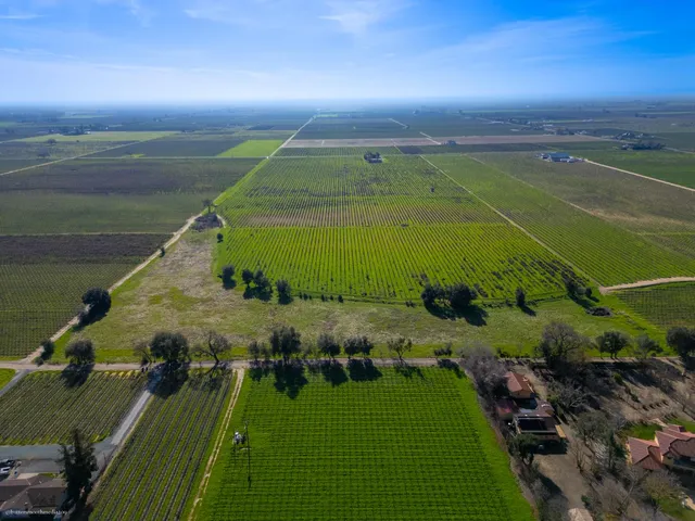 an aerial view of a golf course with a yard