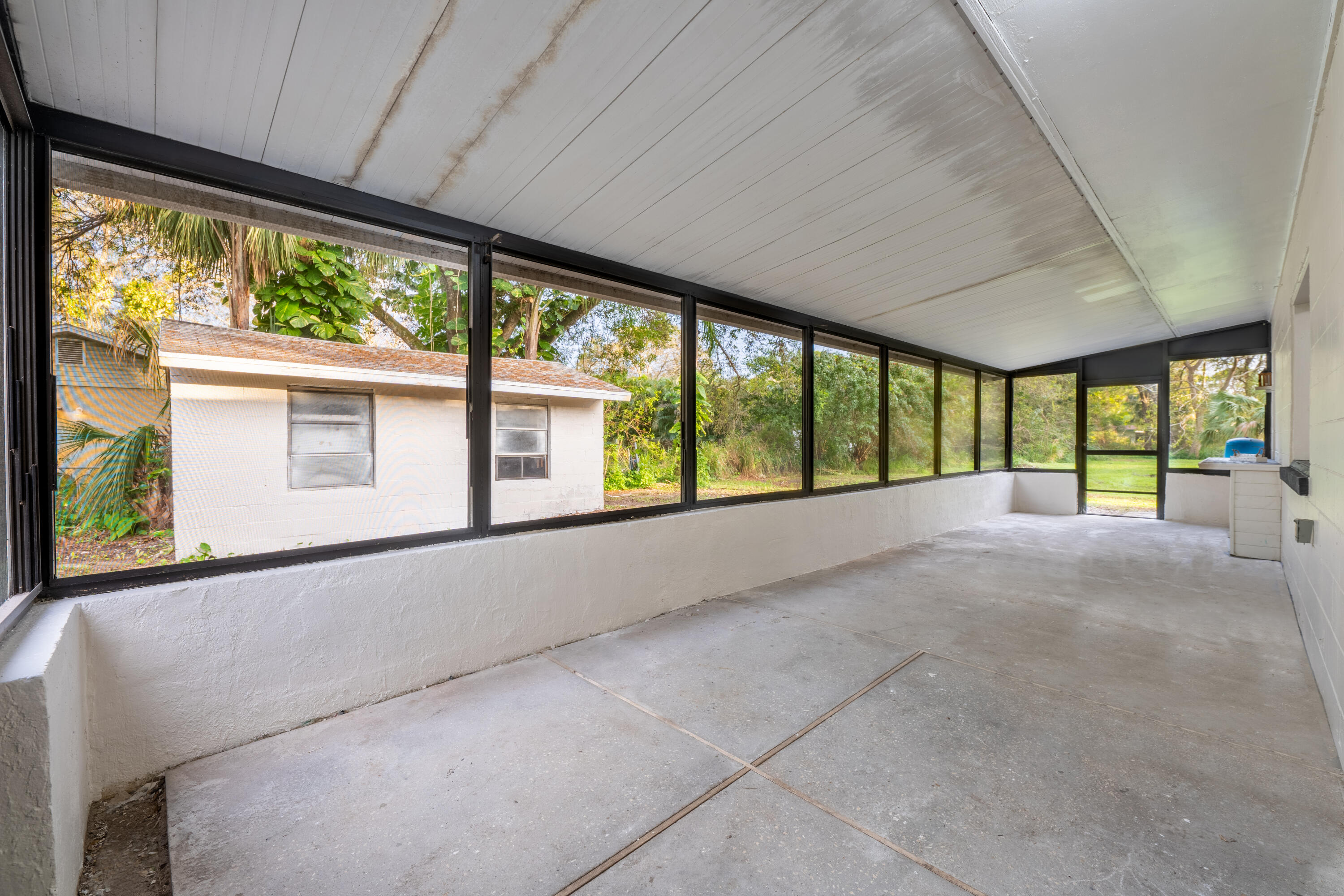 2910 McNeil Road Fort Pierce, FL 34981 - Photo 16 of 21 Back Screen Patio