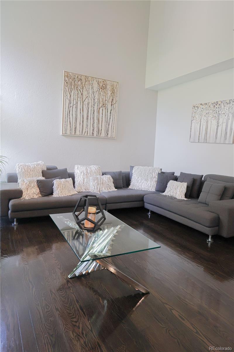 5661 West Lakeridge Road Denver, CO 80227 - Photo 13 of 48 a living room with furniture and a couch