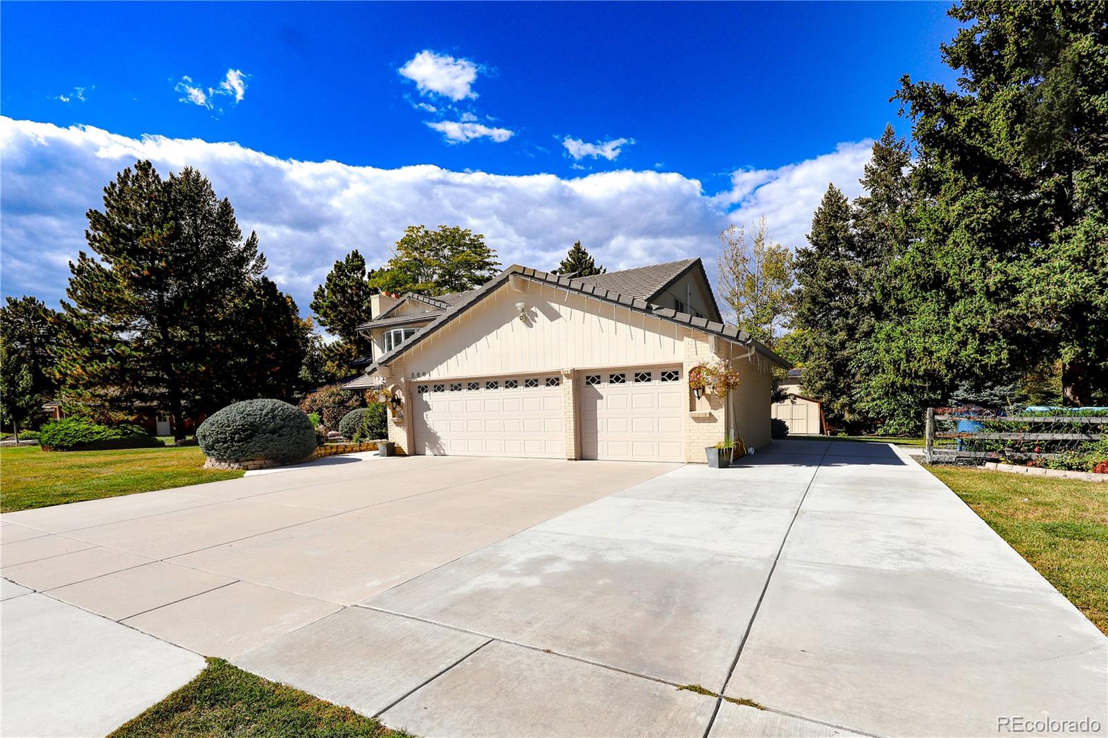 5661 West Lakeridge Road Denver, CO 80227 - Photo 2 of 48 a view of house with yard and entertaining space