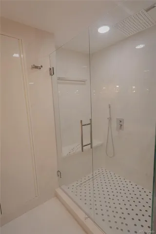 a bedroom with bed and window