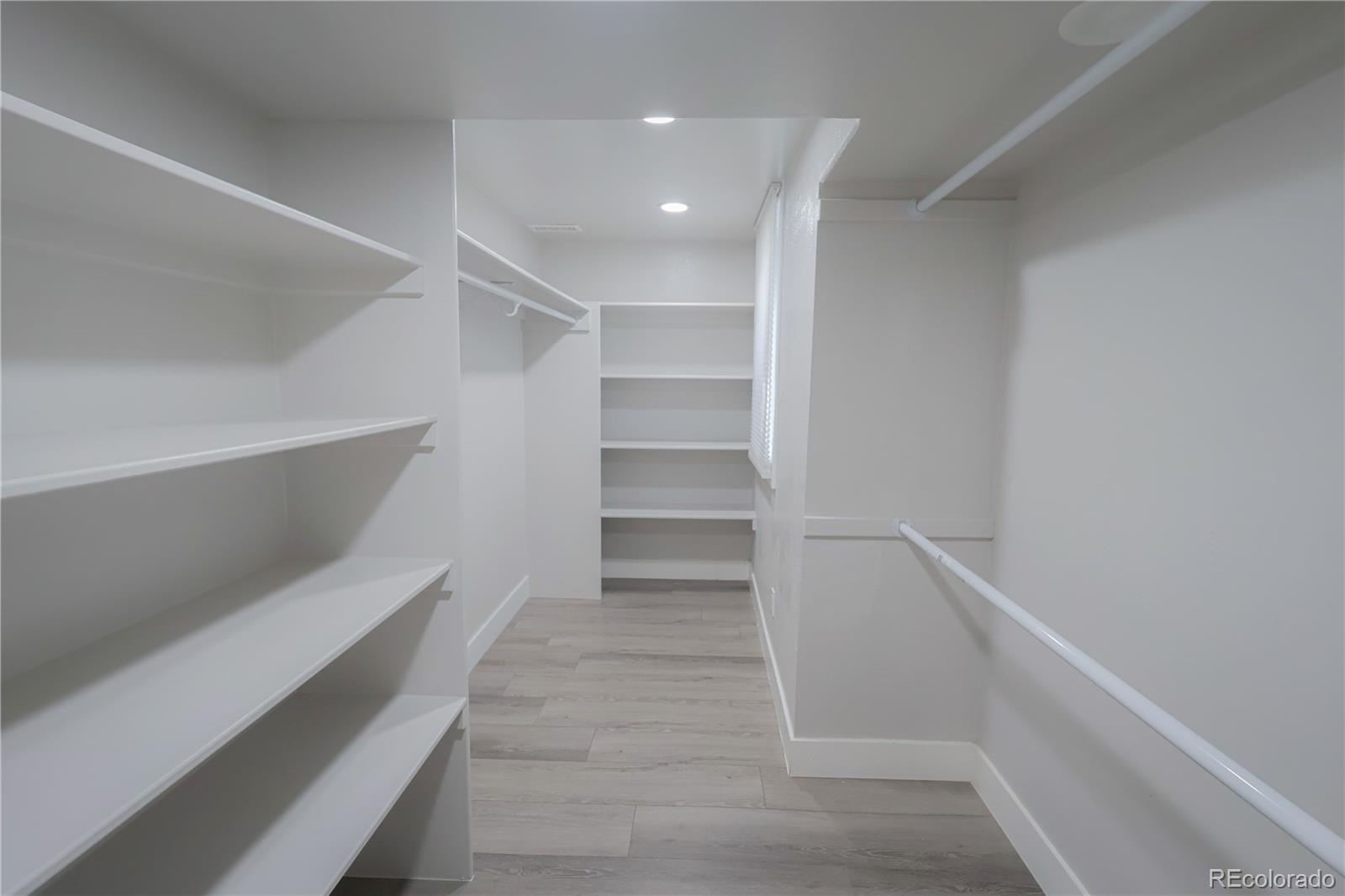 5661 West Lakeridge Road Denver, CO 80227 - Photo 42 of 48 a view of an empty walk in closet