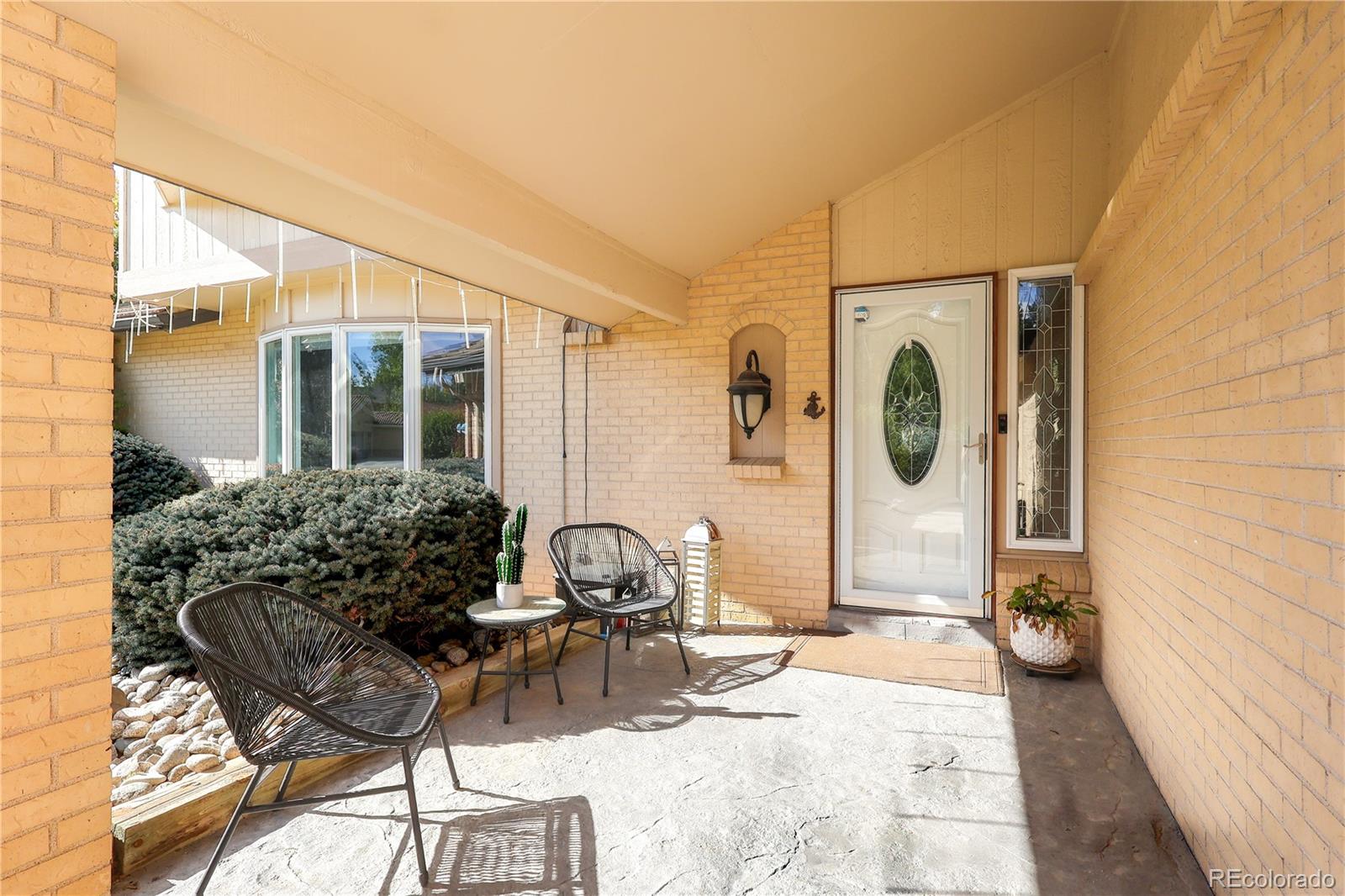 5661 West Lakeridge Road Denver, CO 80227 - Photo 44 of 48 a house view with a outdoor space