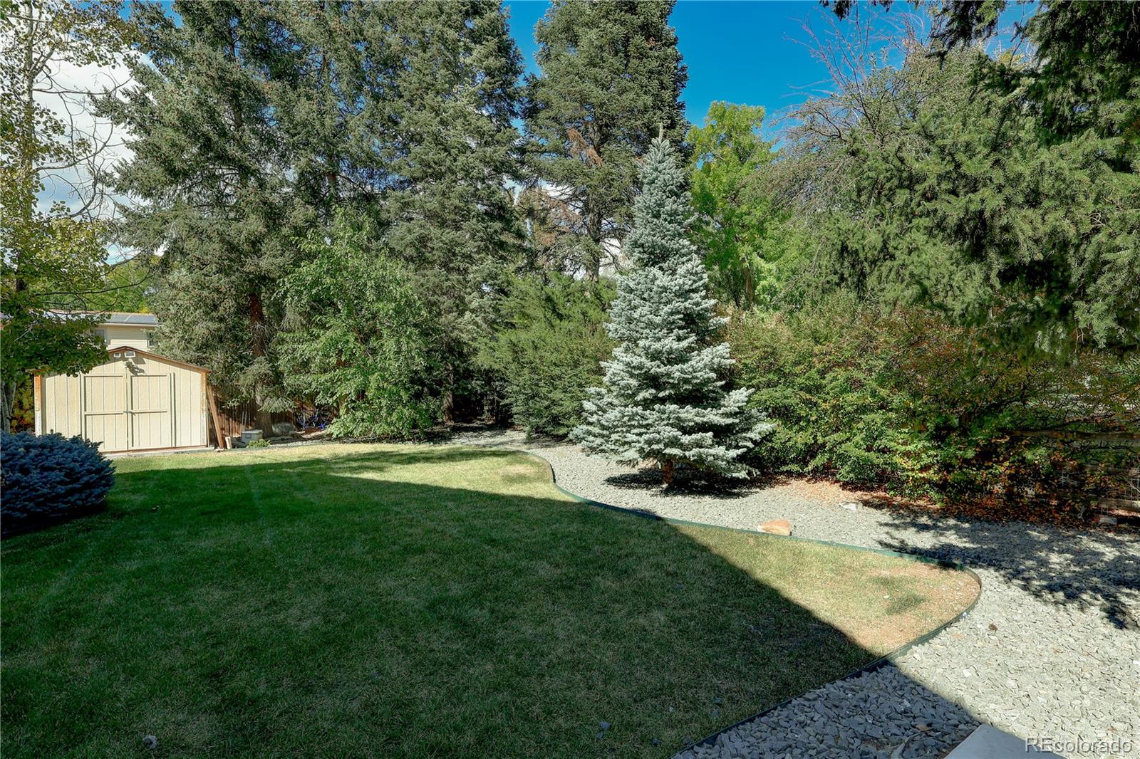 5661 West Lakeridge Road Denver, CO 80227 - Photo 5 of 48 a view of yard with green space