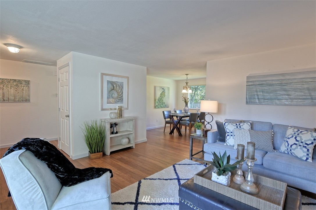 2417 171st Street Southeast Bothell, WA 98012 - Photo 2 of 18 a living room with furniture and wooden floor