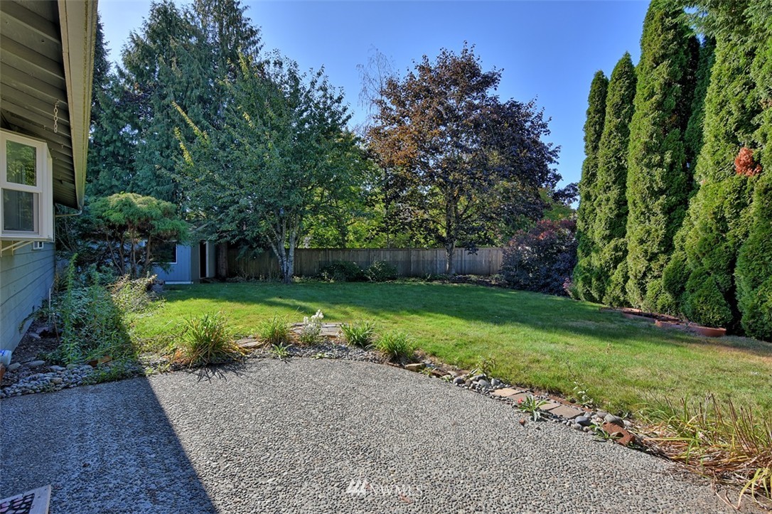 2417 171st Street Southeast Bothell, WA 98012 - Photo 15 of 18 a view of a house with a yard