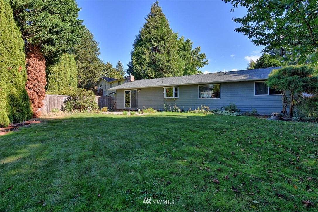 2417 171st Street Southeast Bothell, WA 98012 - Photo 16 of 18 a front view of house with yard and green space