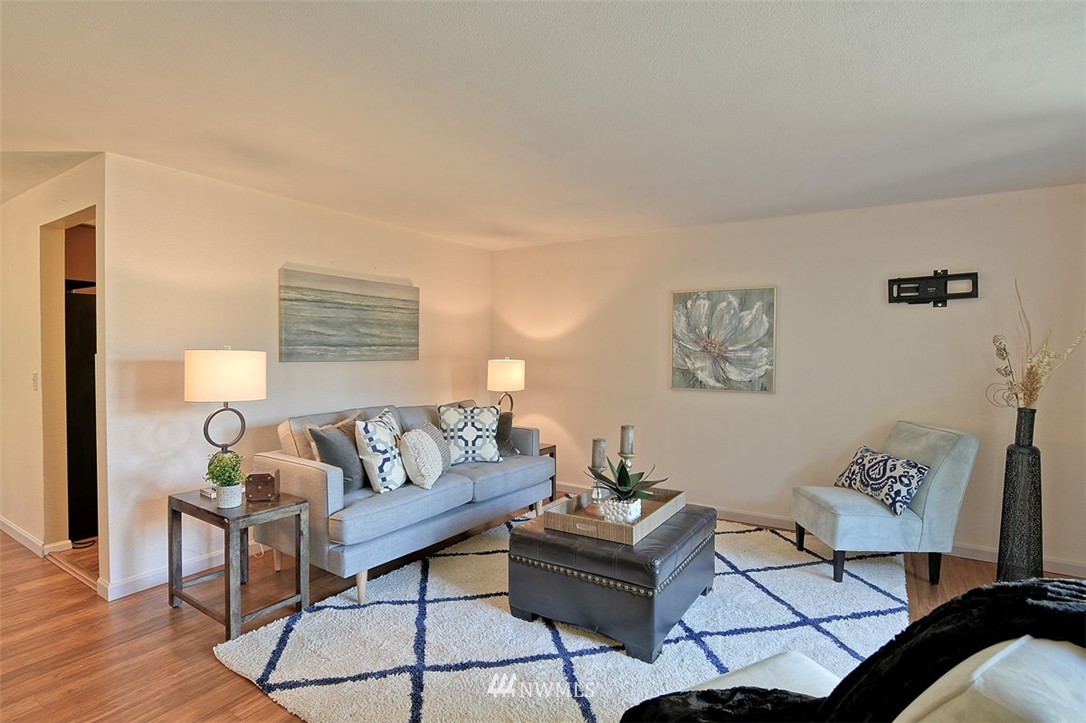 2417 171st Street Southeast Bothell, WA 98012 - Photo 3 of 18 a living room with furniture and wooden floor