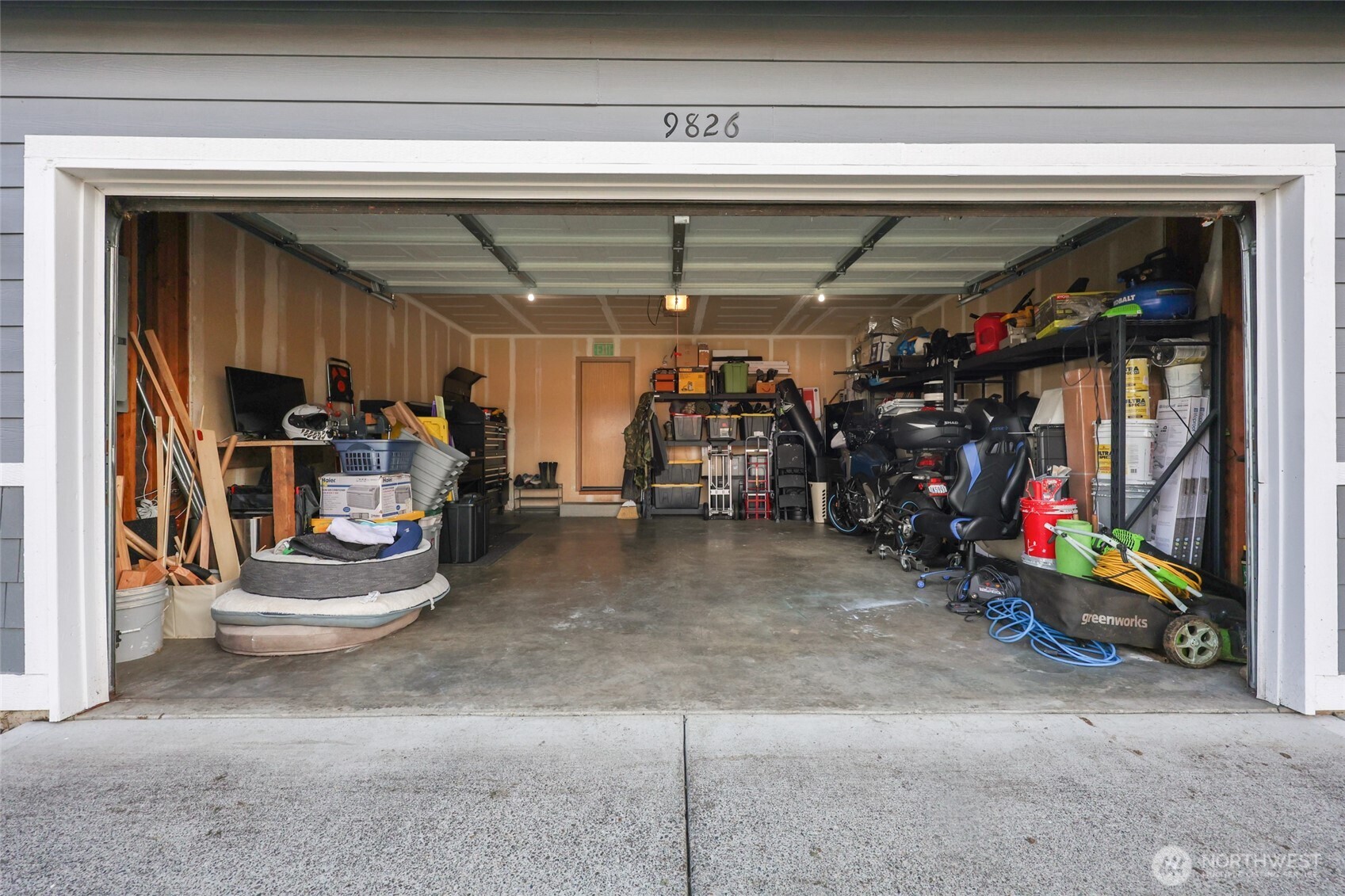 9826 Greenleaf Loop Southeast Yelm, WA 98597 - Photo 15 of 36 a view of a storage room with a lot of stuff