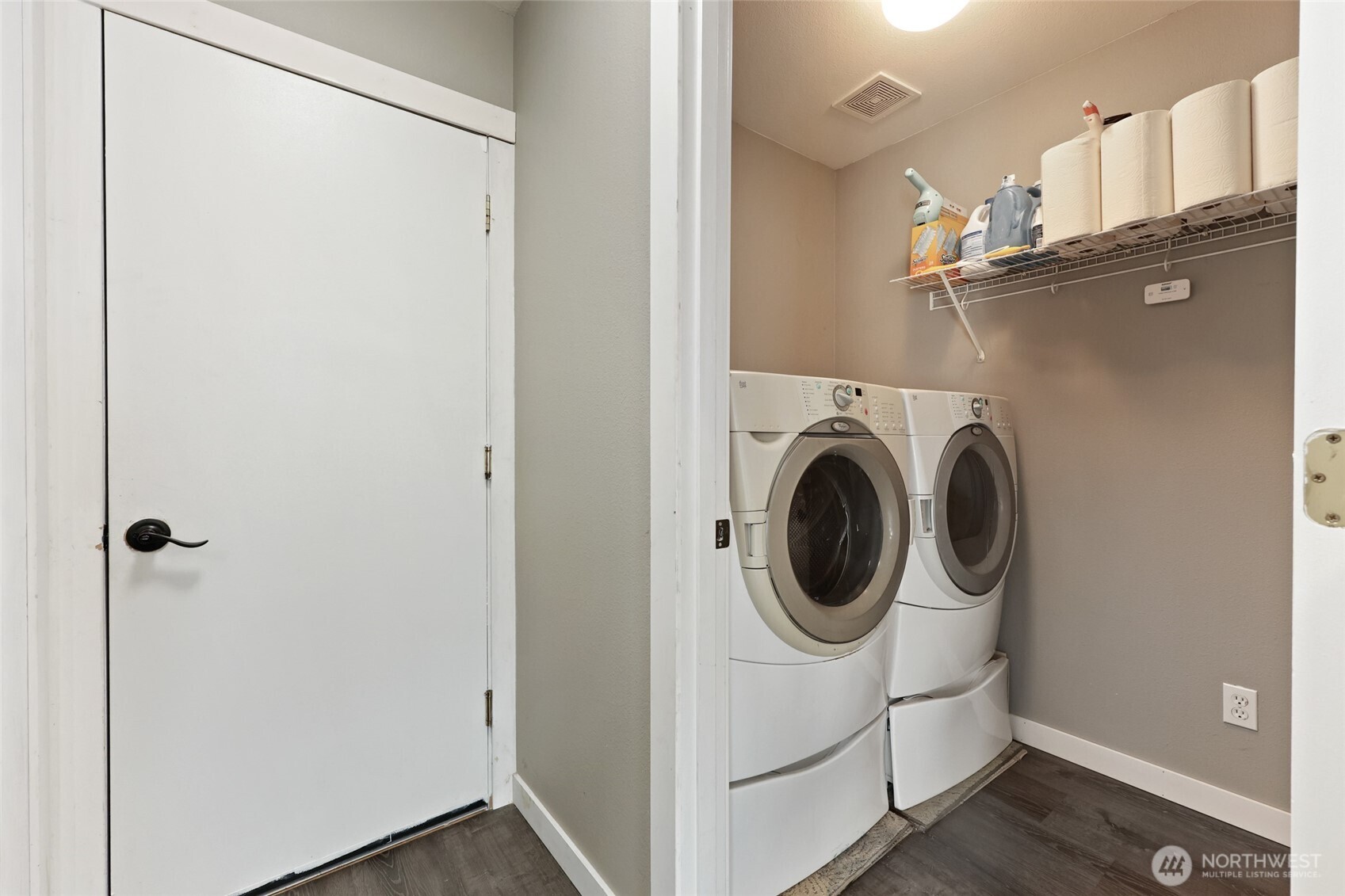 9826 Greenleaf Loop Southeast Yelm, WA 98597 - Photo 17 of 36 a utility room with dryer and washer