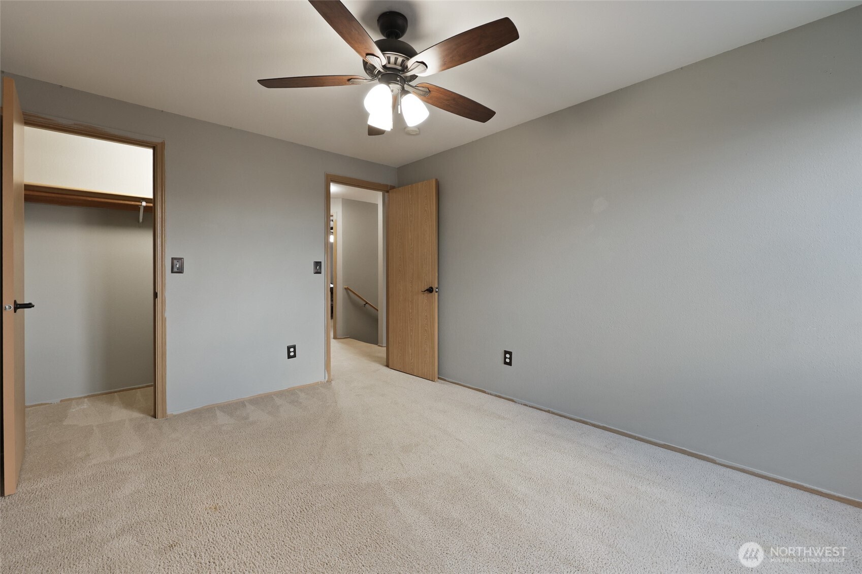 9826 Greenleaf Loop Southeast Yelm, WA 98597 - Photo 24 of 36 an empty room with a ceiling fan and a window