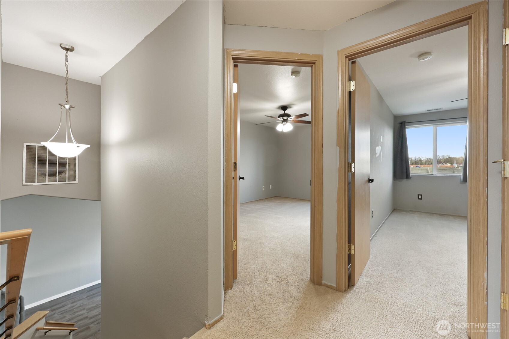 9826 Greenleaf Loop Southeast Yelm, WA 98597 - Photo 27 of 36 a view of a room with a furniture and mirror