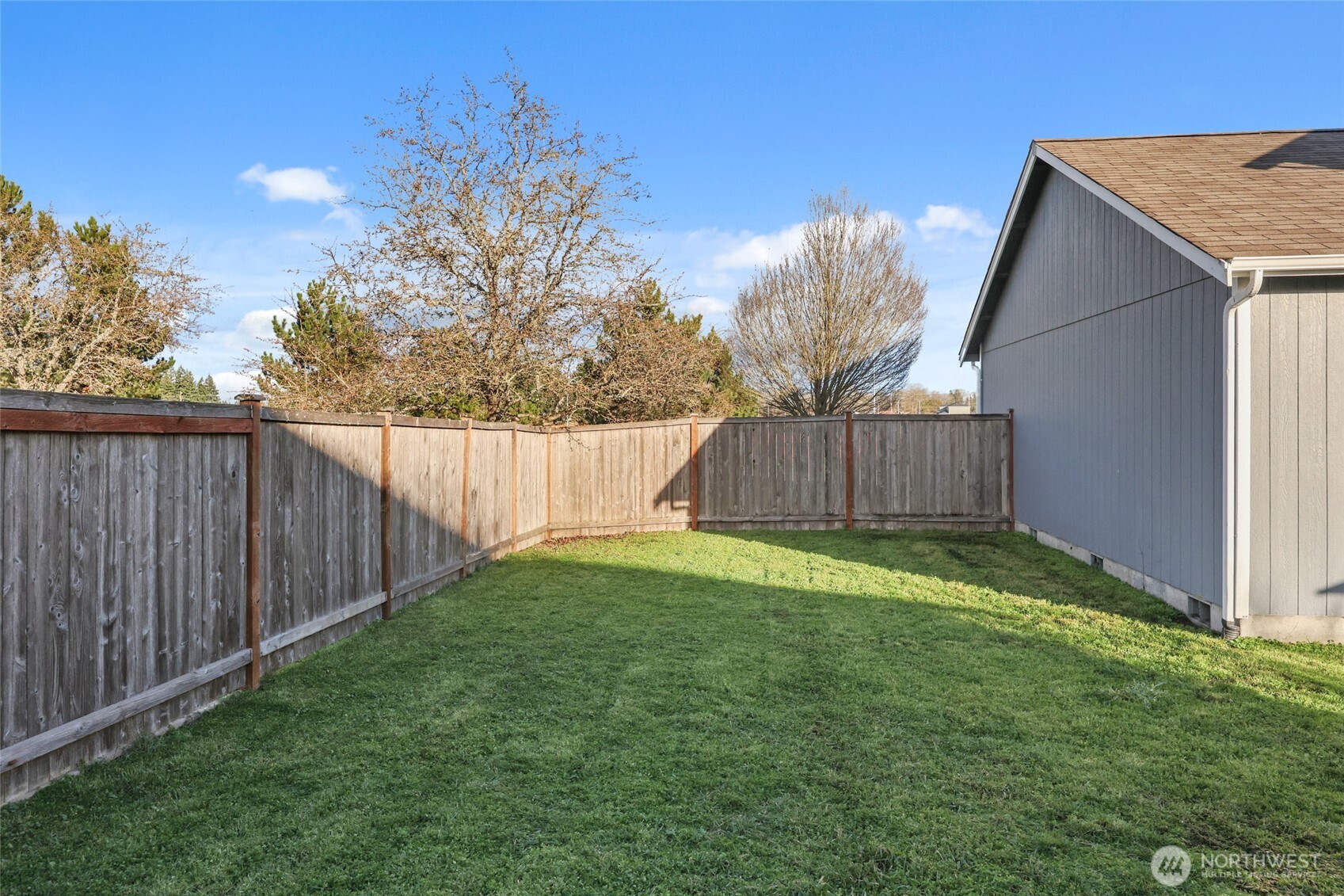 9826 Greenleaf Loop Southeast Yelm, WA 98597 - Photo 31 of 36 a view of a backyard