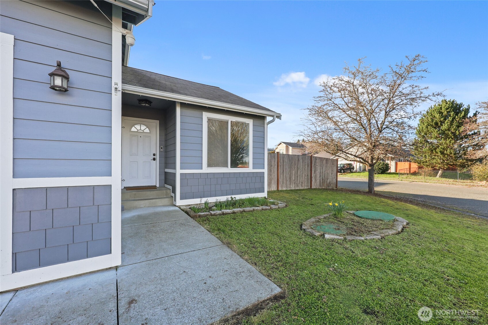 9826 Greenleaf Loop Southeast Yelm, WA 98597 - Photo 33 of 36 a view of a house with a yard