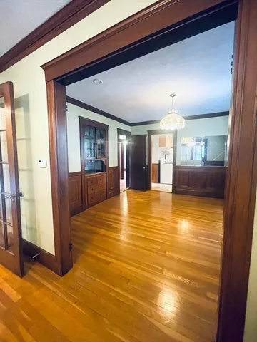 a view of a living room with a large window