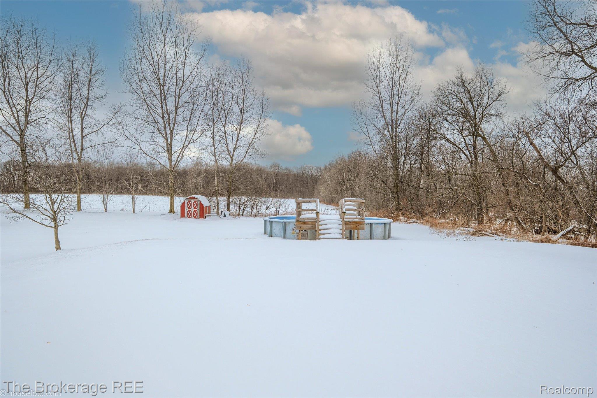 8247 North Center Road Mount Morris, MI 48458 - Photo 2 of 46 View of yard layered in snow