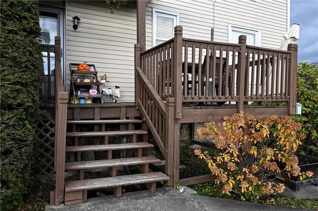 a view of stairs and wooden floor