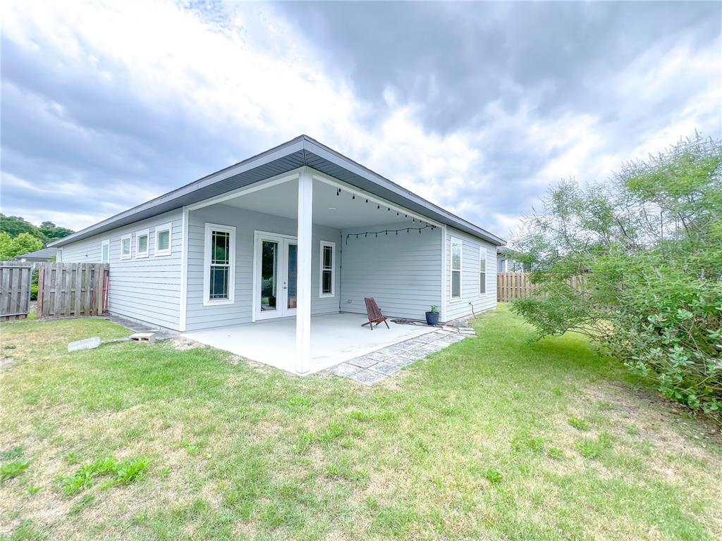 9340 Southwest 67th Lane Gainesville, FL 32608 - Photo 16 of 16 a front view of house with yard and green space